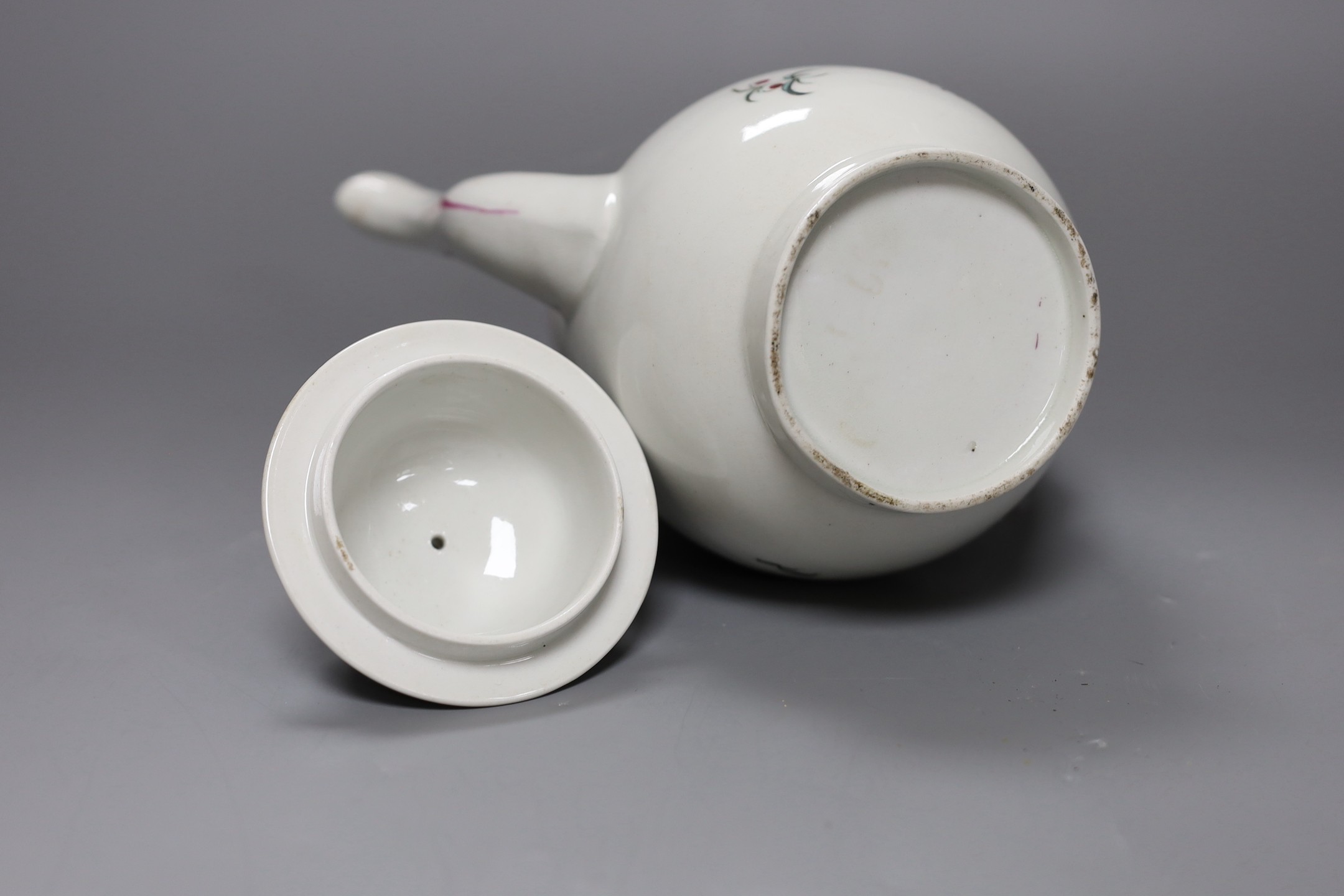 A Chinese export famille rose coffee pot and cover, circa 1800, 25 cms high